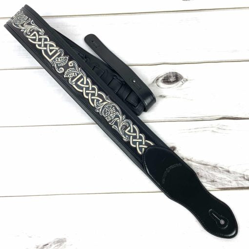 Walker And Williams KB-05-BLK Gloss Black Full Grain Center Block Carving Leather Padded Strap With Aged White Celtic Knot